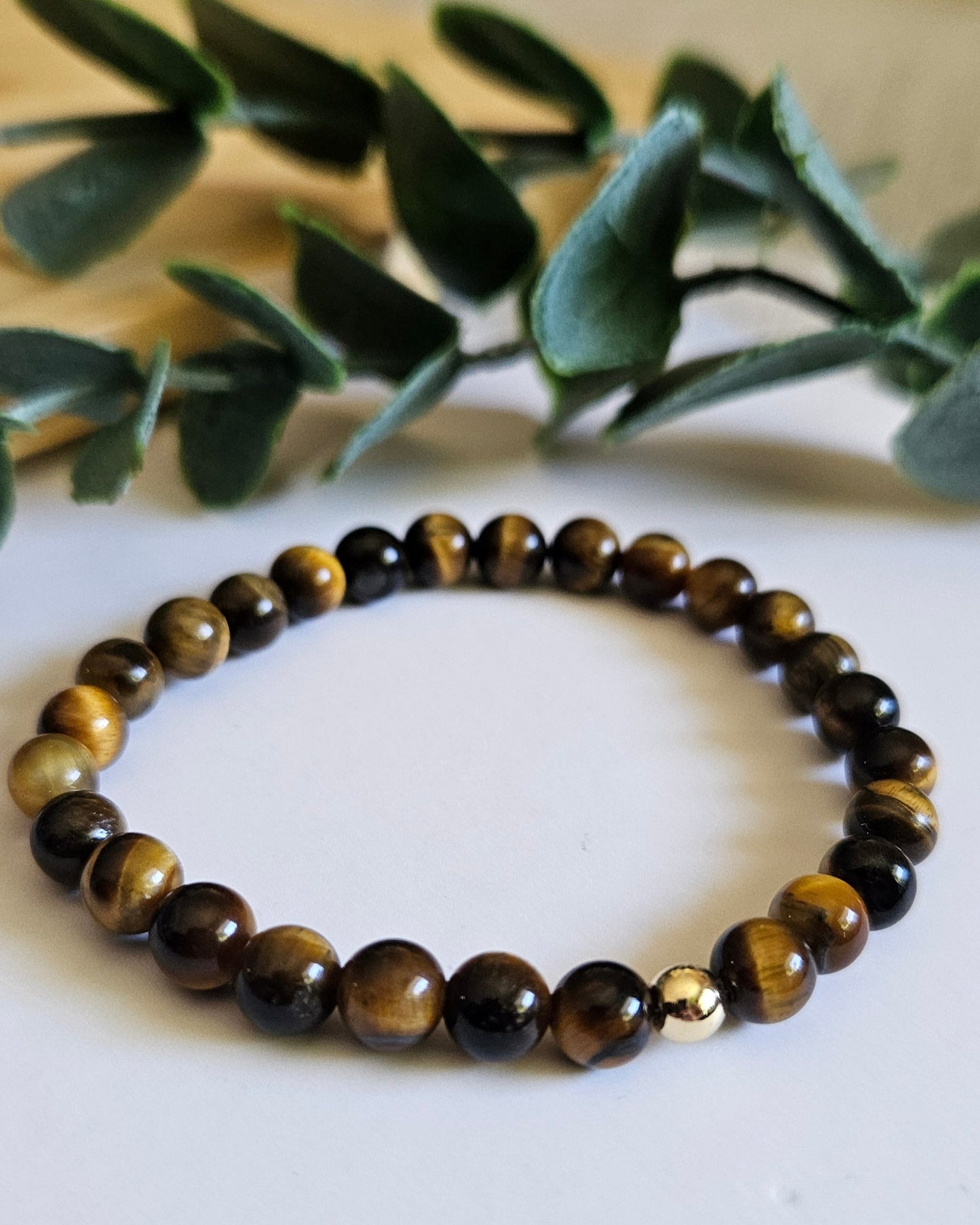 Beaded bracelet with brown and gold stones
