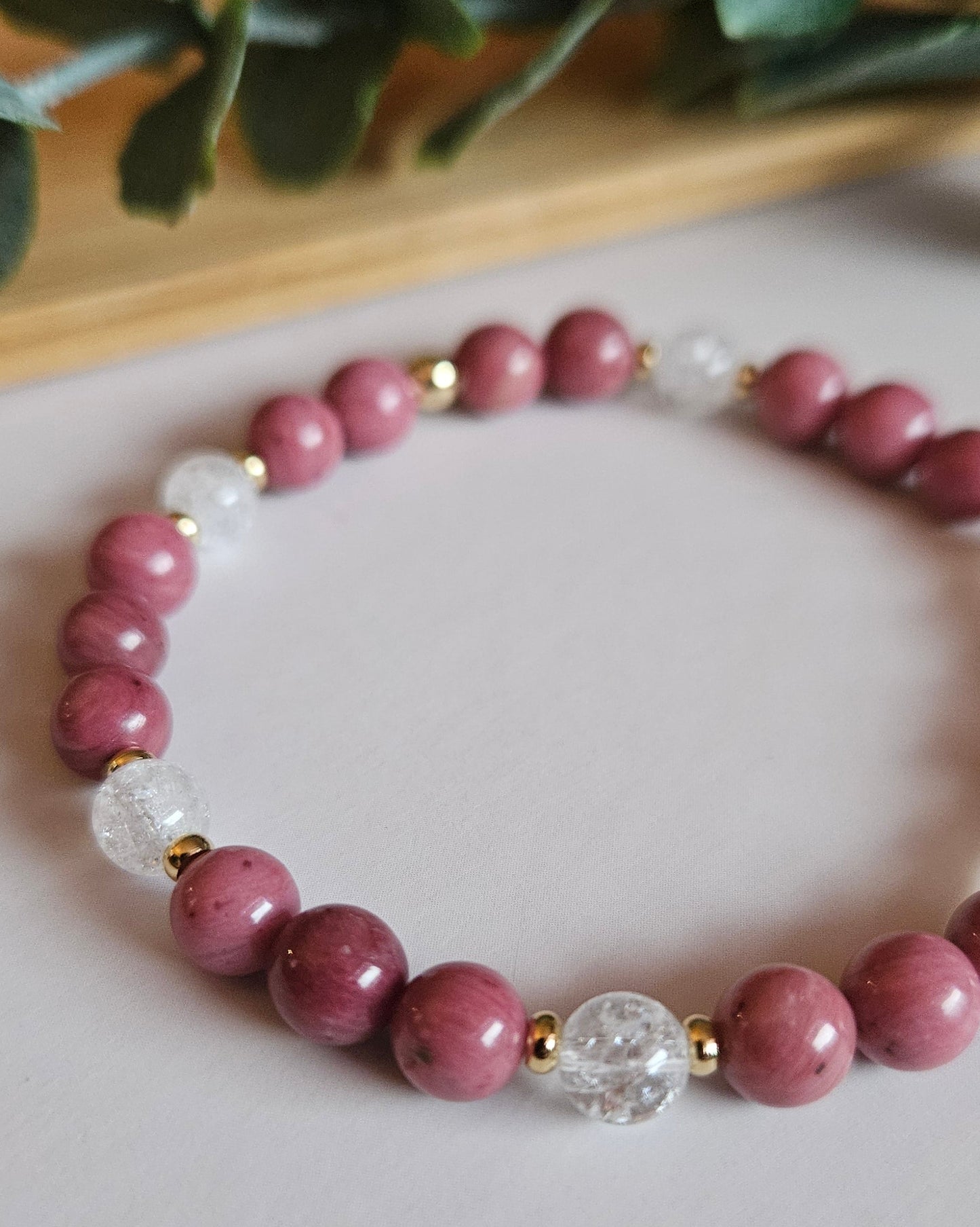 pink beaded bracelet with 14k gold