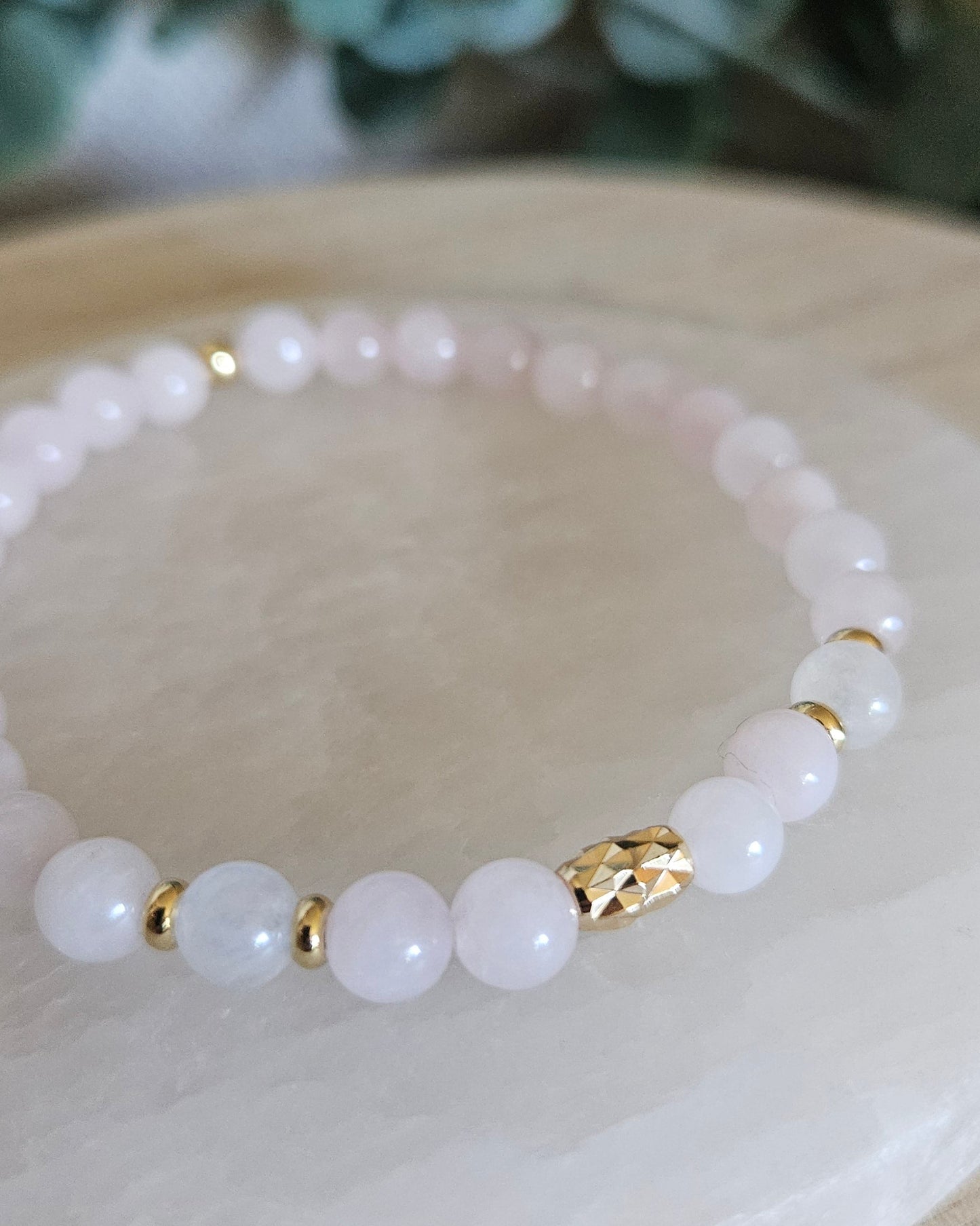 Close-up of the Rose Quartz and Moonstone beads, gold-plated spacers and faceted gold focal accent
