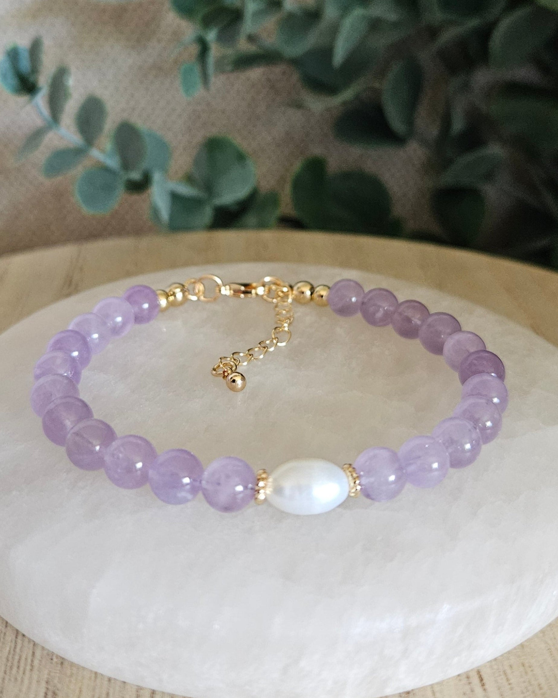 Purple bracelet with freshwater pearl focal 