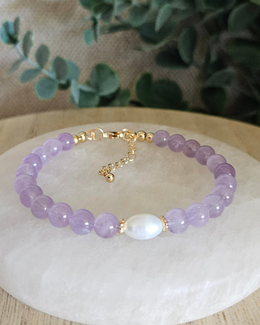 Purple bracelet with freshwater pearl focal 
