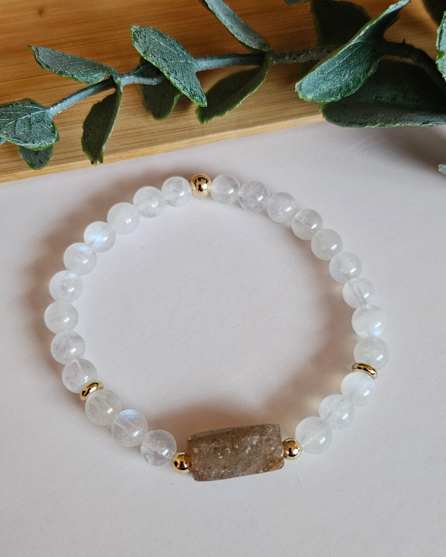 beaded bracelet with gold accents