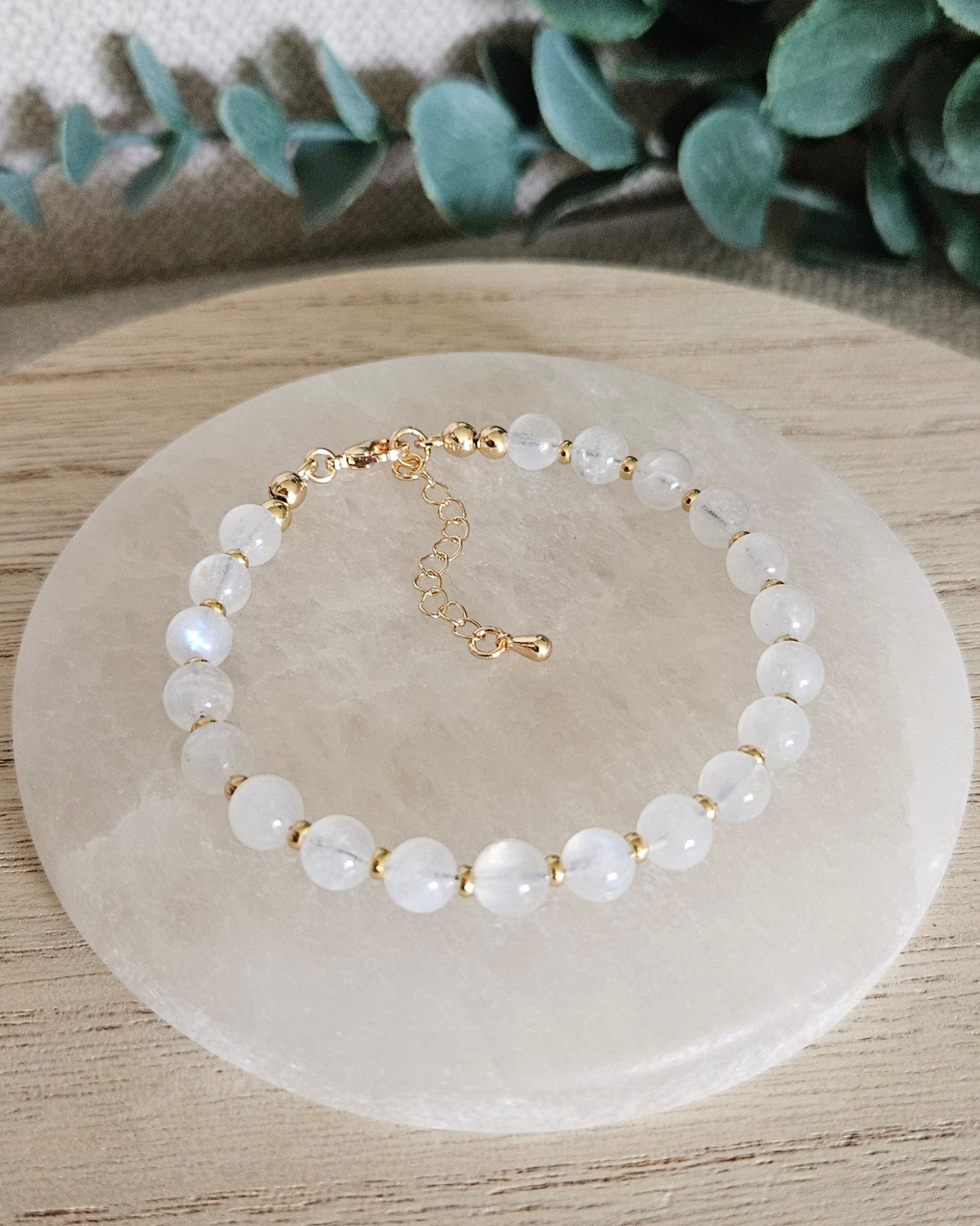 moonstone bracelet on a selenite plate