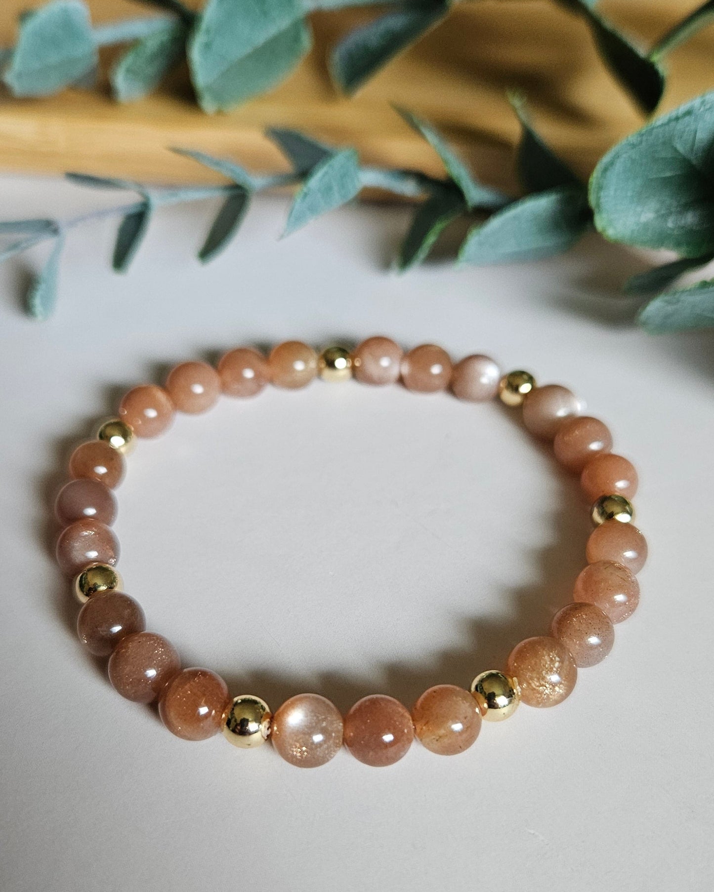 Radiant Sunstone bracelet with 14k gold-plated beads designed to inspire joy, vitality, and confidence