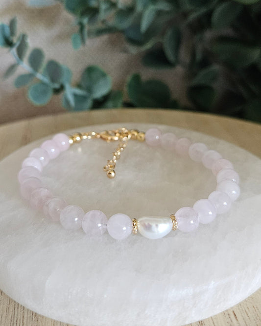 Rose Quartz Bracelet with a freshwater pearl focal and gold accents