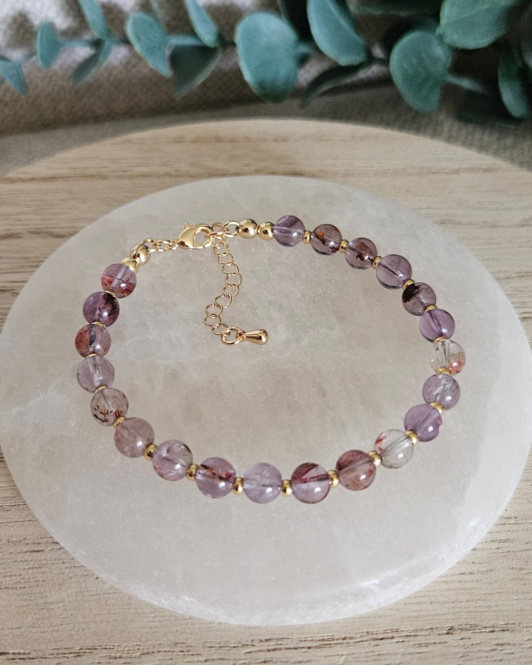 super seven bracelet on selenite plate