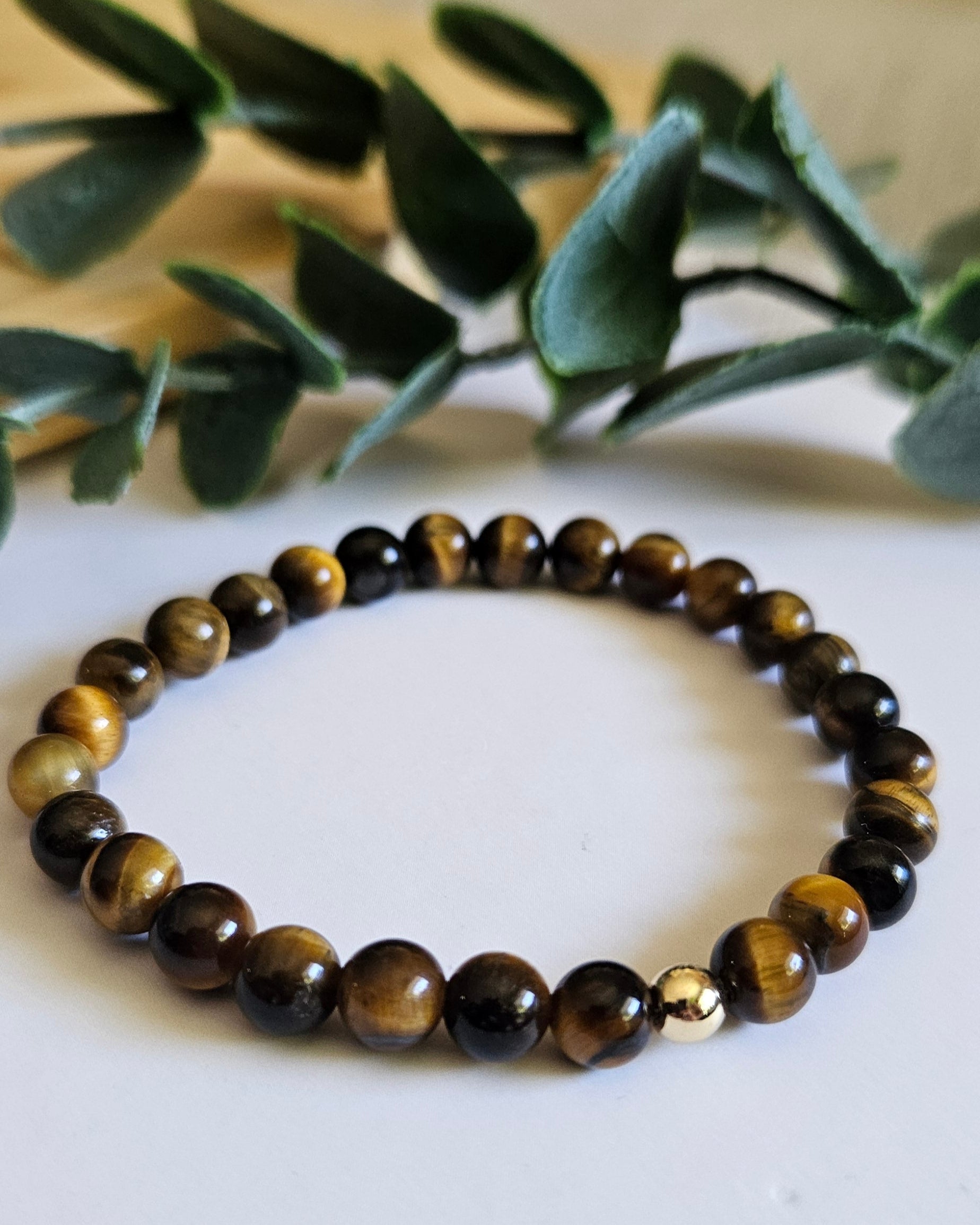 Beaded bracelet with brown and gold stones
