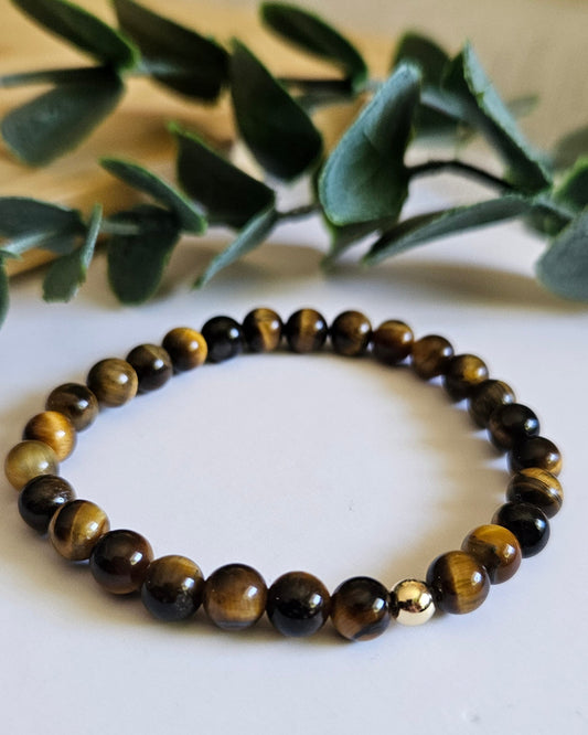 Beaded bracelet with brown and gold stones