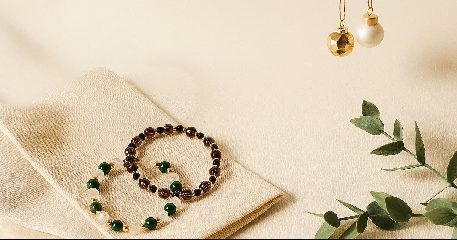 two bracelets with christmas ornaments