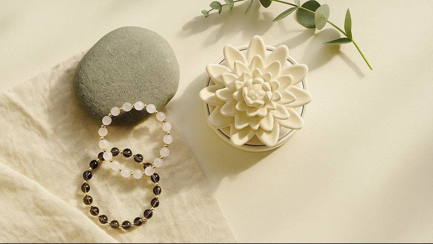 White ceramic flower pot with a bracelet on a beige surface