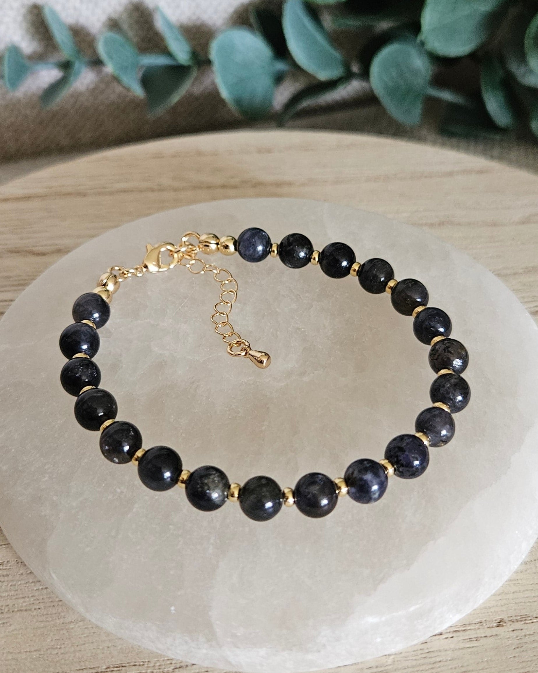 dark blue bracelet with gold accents