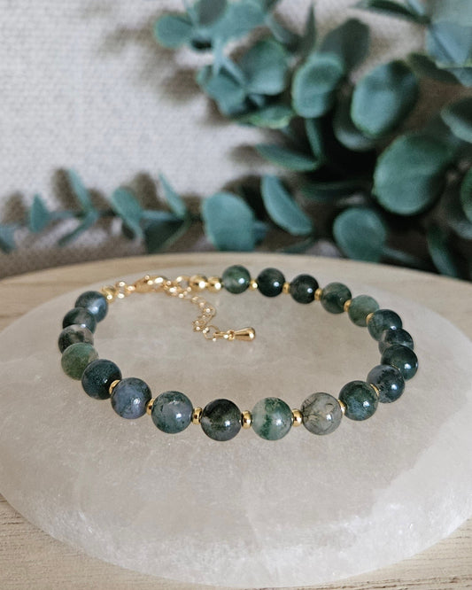 moss agate bracelet on selenite plate